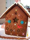 Stars embossed into the gingerbread dough before baking