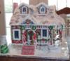Hard to see but there are 2 icing rocking chairs on the front porch